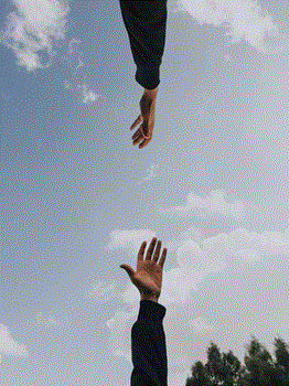 Hands reaching out Hands reaching out